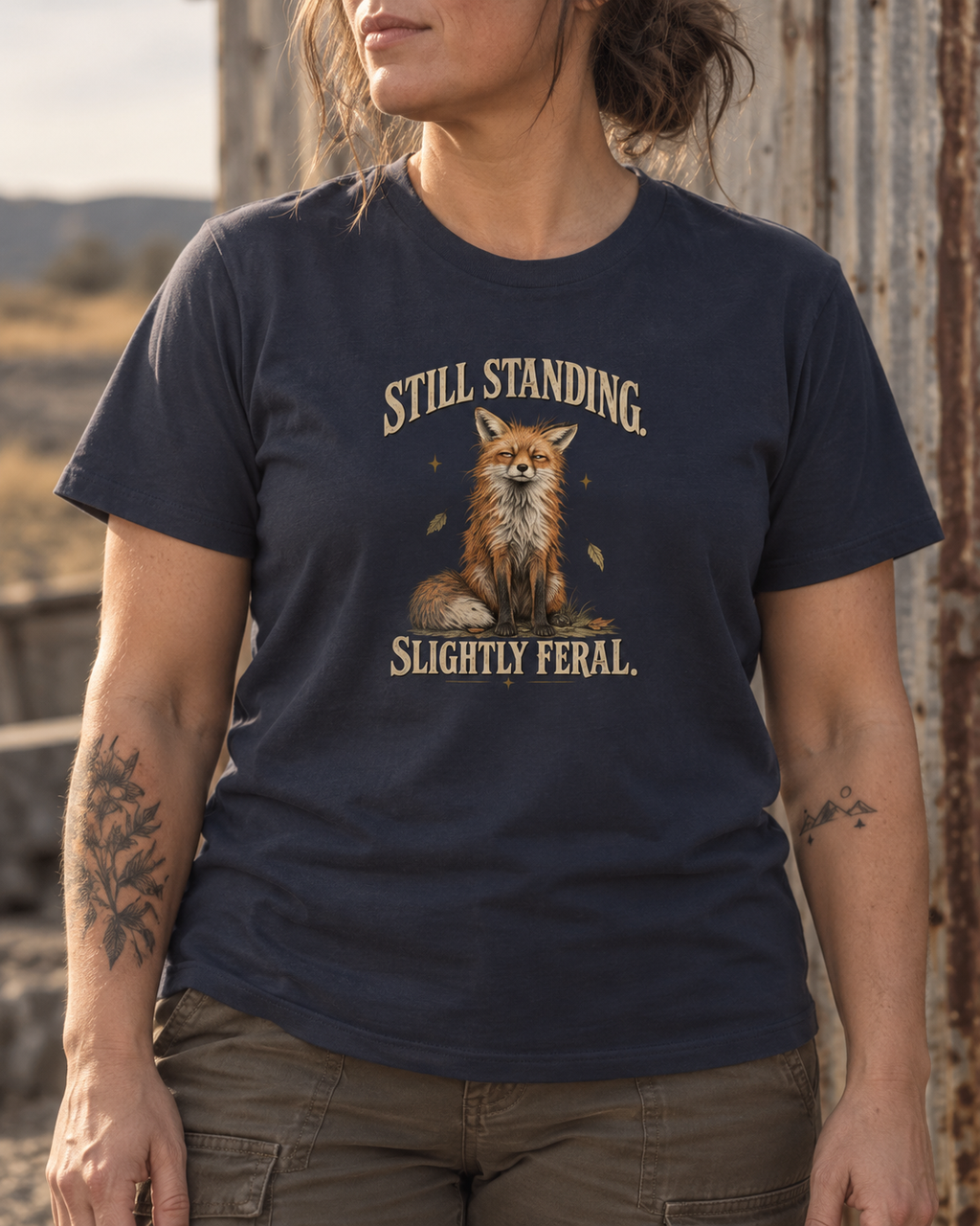 Still Standing. Slightly Feral. Tee